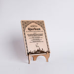 Wooden Qurban card with a stand on a white background