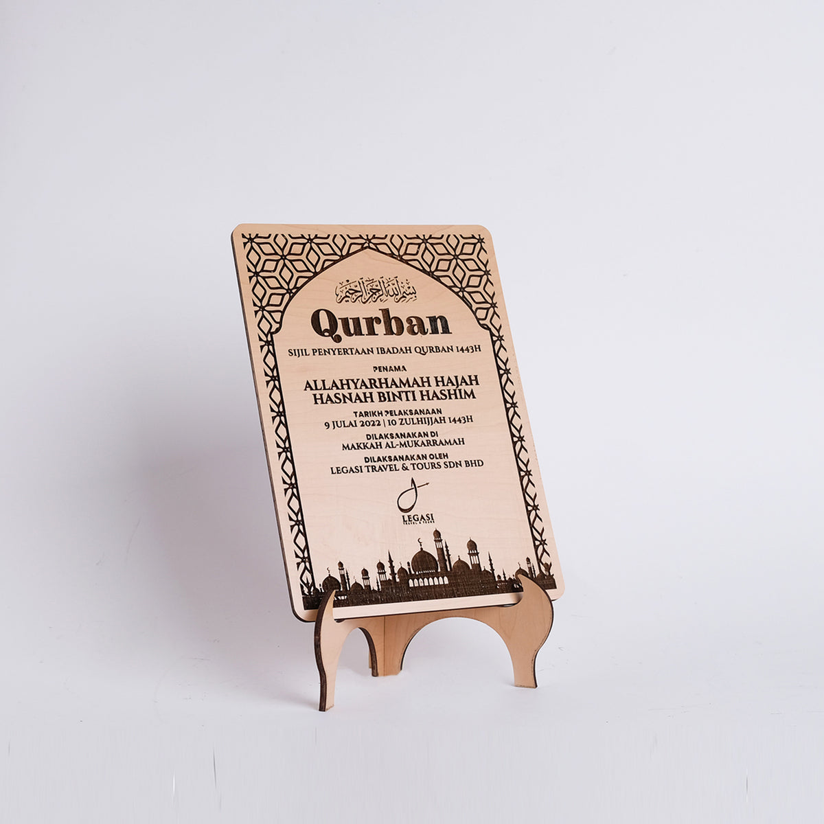 Wooden Qurban card with a stand on a white background