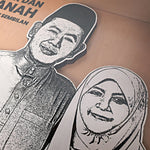 Black and white cut-out of a man and woman on a cardboard background