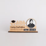 Graduation-themed decorative plaque with a photo of a person and text on a white background